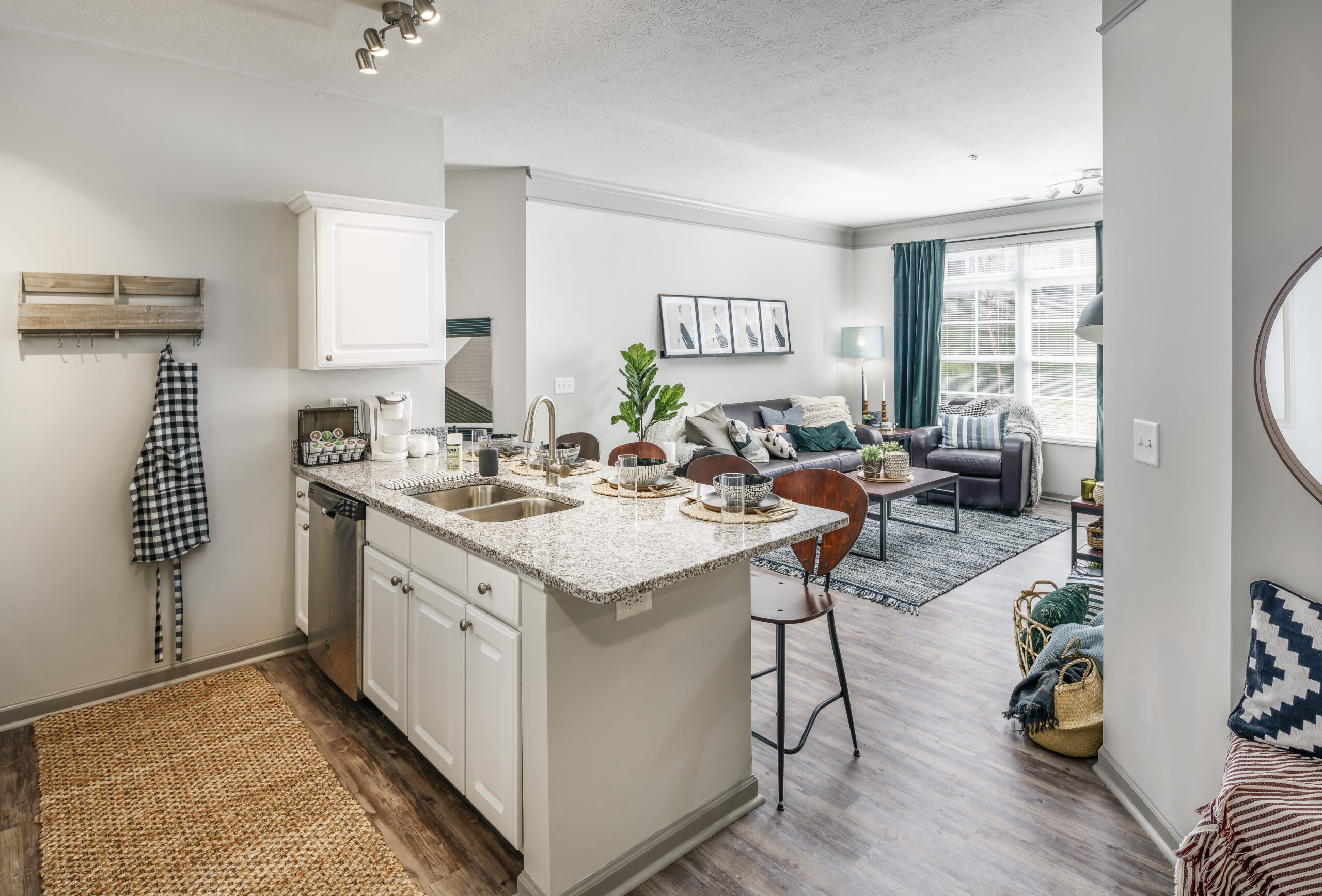 kitchen with living room in the background